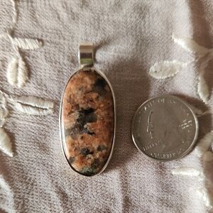 Silver Pendant With Brown Stone